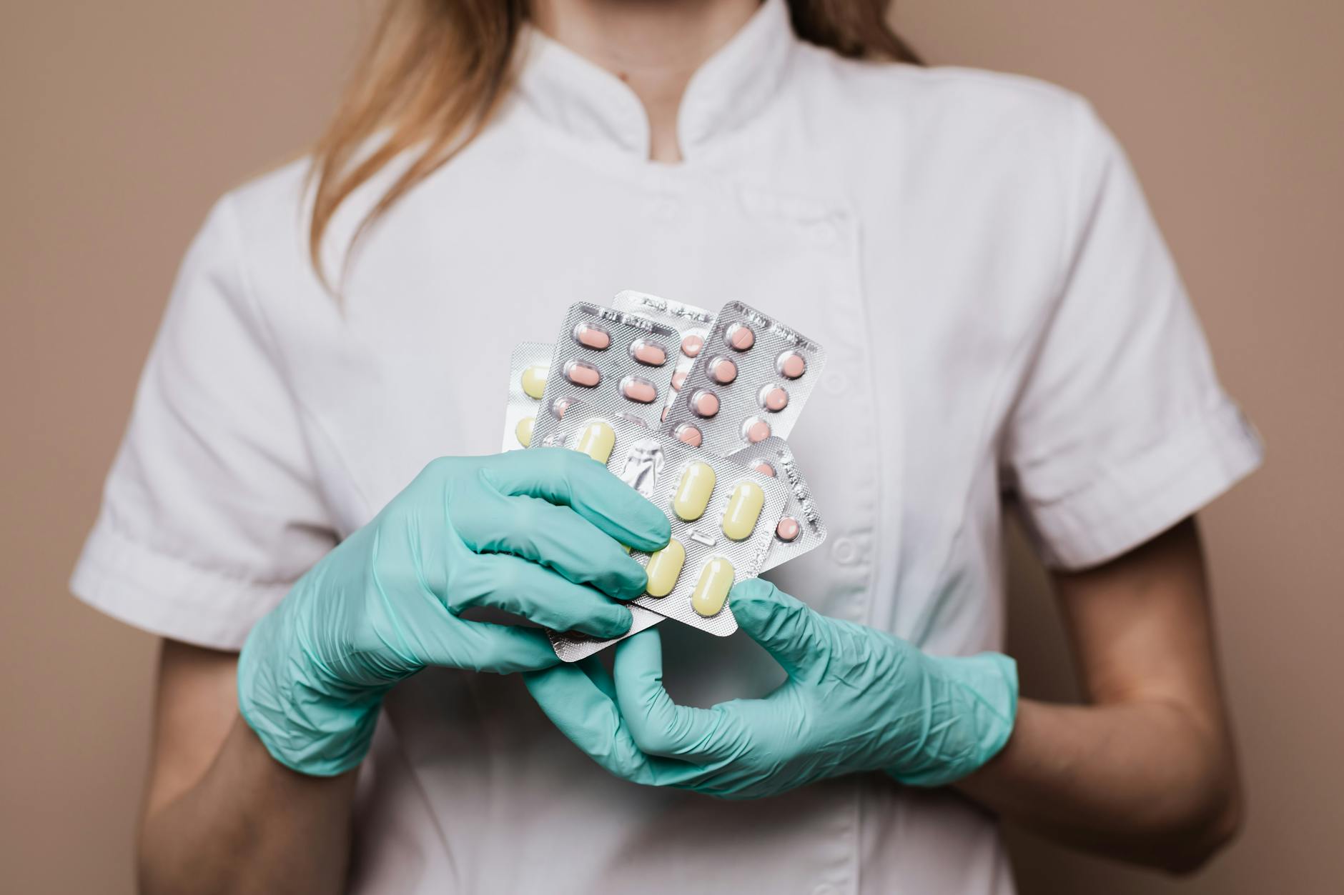 person holding medicines