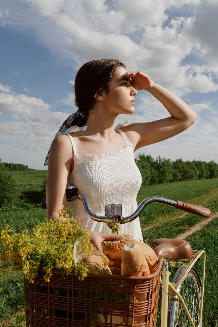 woman with bicycle looking
